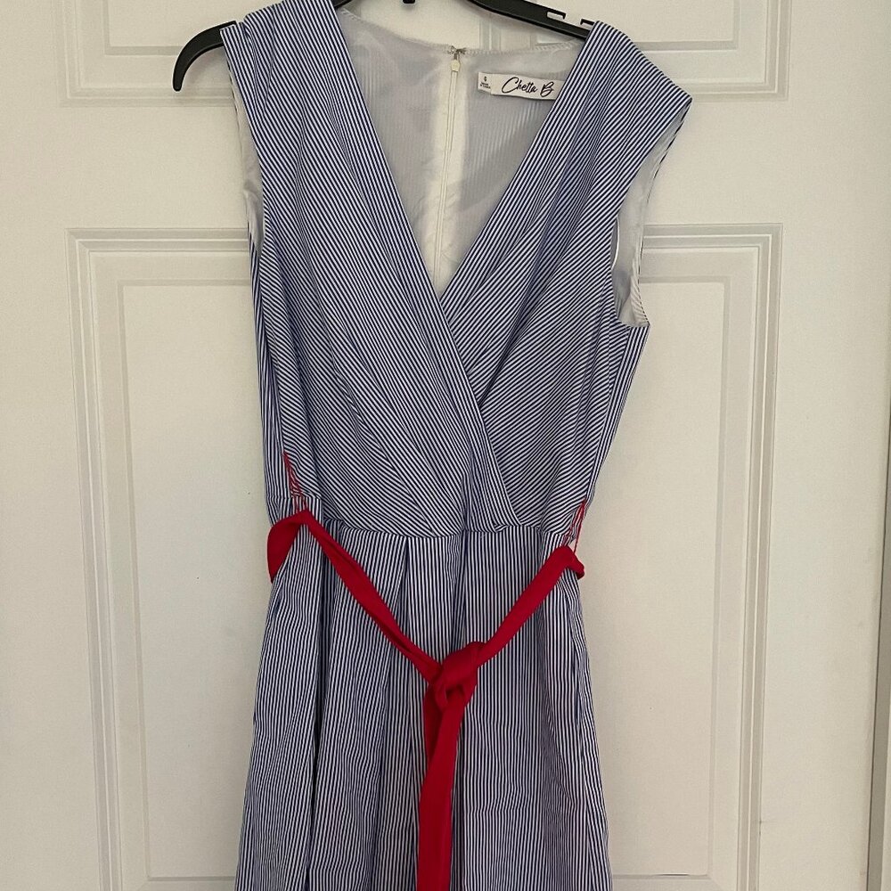 blue white striped sleevless V neck box  pleat dress with red tie